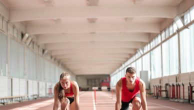 young athletes preparing for running in training hall